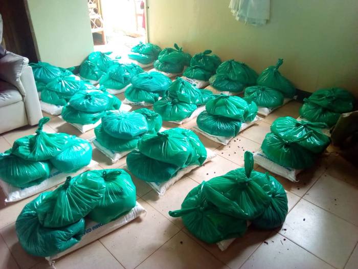 Bags of food packed and ready for distribution to families in Uganda during COVID-19